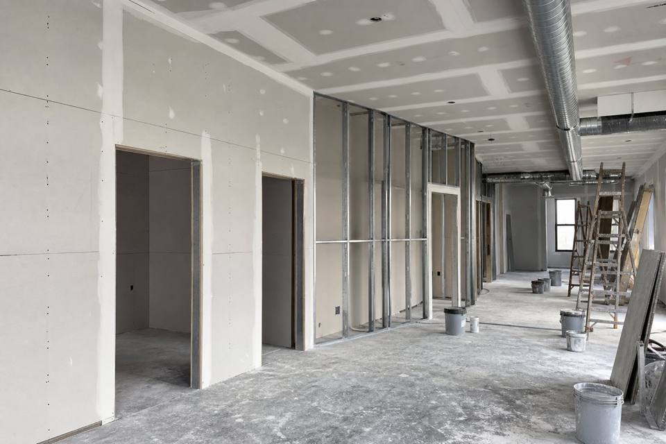 Commercial drywall buildout with metal studs and sheetrock for Brevard County drywall projects